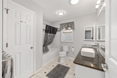 Unique site-built home on hole number 3 of The Orange Blossom on Orange Blossom Hills Golf and Country Club in Florida - for sale on GolfHomes.com, golf home, golf lot