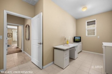 This delightful single-level 2-bedroom, 2-bathroom home is on Conestoga Golf Club in Nevada - for sale on GolfHomes.com, golf home, golf lot