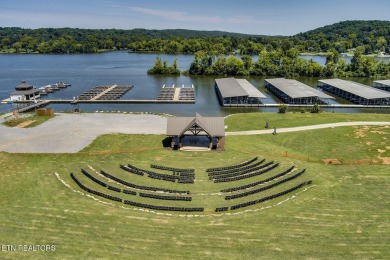 This spectacular 0.62-acre lot, ideal for a walk-out basement on Tennessee National Golf Club in Tennessee - for sale on GolfHomes.com, golf home, golf lot