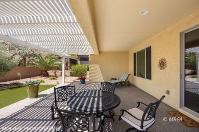 This delightful single-level 2-bedroom, 2-bathroom home is on Conestoga Golf Club in Nevada - for sale on GolfHomes.com, golf home, golf lot