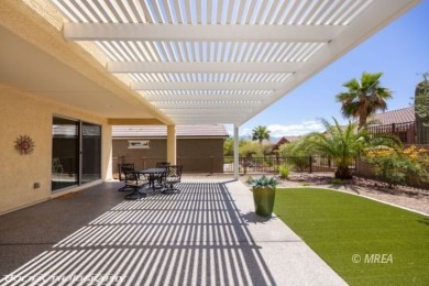 This delightful single-level 2-bedroom, 2-bathroom home is on Conestoga Golf Club in Nevada - for sale on GolfHomes.com, golf home, golf lot