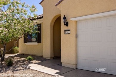 This delightful single-level 2-bedroom, 2-bathroom home is on Conestoga Golf Club in Nevada - for sale on GolfHomes.com, golf home, golf lot