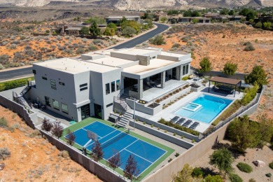 Entering through the striking metal-glass front door into a on The Ledges Golf Club in Utah - for sale on GolfHomes.com, golf home, golf lot