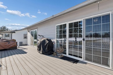 Wake up to sweeping golf course and mountain views in this on Village Greens Golf Club in Montana - for sale on GolfHomes.com, golf home, golf lot