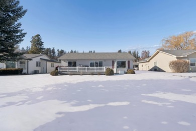 Wake up to sweeping golf course and mountain views in this on Village Greens Golf Club in Montana - for sale on GolfHomes.com, golf home, golf lot