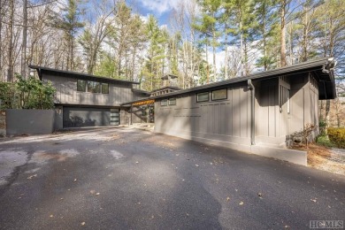 Located in Golf Club Estates, this modern residence, masterfully on The Country Club of Sapphire Valley in North Carolina - for sale on GolfHomes.com, golf home, golf lot