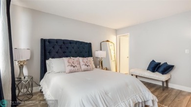Beautifully remodeled condo with an open spacious layout! Tile on  in Florida - for sale on GolfHomes.com, golf home, golf lot