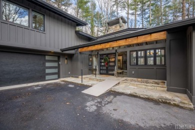 Located in Golf Club Estates, this modern residence, masterfully on The Country Club of Sapphire Valley in North Carolina - for sale on GolfHomes.com, golf home, golf lot