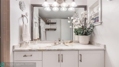 Beautifully remodeled condo with an open spacious layout! Tile on  in Florida - for sale on GolfHomes.com, golf home, golf lot