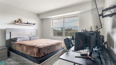 Beautifully remodeled condo with an open spacious layout! Tile on  in Florida - for sale on GolfHomes.com, golf home, golf lot
