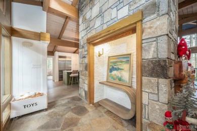 Located in Golf Club Estates, this modern residence, masterfully on The Country Club of Sapphire Valley in North Carolina - for sale on GolfHomes.com, golf home, golf lot