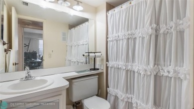Beautifully remodeled condo with an open spacious layout! Tile on  in Florida - for sale on GolfHomes.com, golf home, golf lot