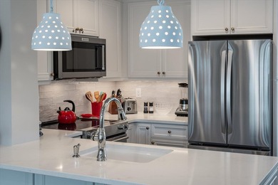 RENOVATED TOP FLOOR END UNIT WITH OCEAN AND GOLF COURSE VIEWS! on Wild Dunes Harbor Golf Resort in South Carolina - for sale on GolfHomes.com, golf home, golf lot