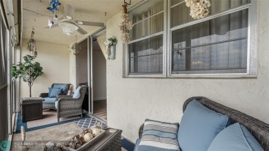 Beautifully remodeled condo with an open spacious layout! Tile on  in Florida - for sale on GolfHomes.com, golf home, golf lot