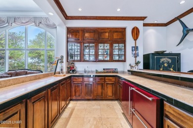 Experience one of Lake Havasu's most iconic residences, a true on London Bridge Golf Course in Arizona - for sale on GolfHomes.com, golf home, golf lot
