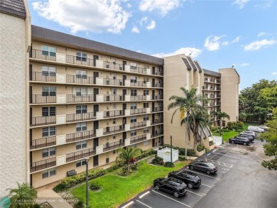 Beautifully remodeled condo with an open spacious layout! Tile on  in Florida - for sale on GolfHomes.com, golf home, golf lot