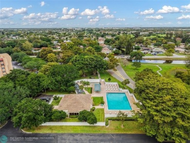 Beautifully remodeled condo with an open spacious layout! Tile on  in Florida - for sale on GolfHomes.com, golf home, golf lot