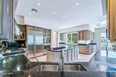 Experience one of Lake Havasu's most iconic residences, a true on London Bridge Golf Course in Arizona - for sale on GolfHomes.com, golf home, golf lot
