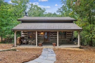 Oh my goodness! This home is an actual cabin and is amazing on Big Canoe Golf Club - Cherokee in Georgia - for sale on GolfHomes.com, golf home, golf lot