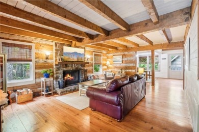 Oh my goodness! This home is an actual cabin and is amazing on Big Canoe Golf Club - Cherokee in Georgia - for sale on GolfHomes.com, golf home, golf lot