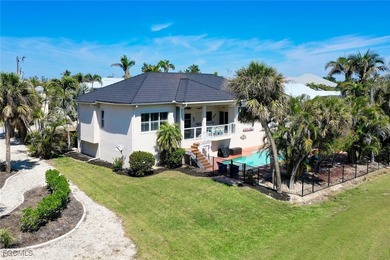 This impeccably maintained traditional style home sits on a on Beachview Golf Club in Florida - for sale on GolfHomes.com, golf home, golf lot