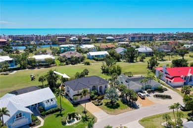 This impeccably maintained traditional style home sits on a on Beachview Golf Club in Florida - for sale on GolfHomes.com, golf home, golf lot