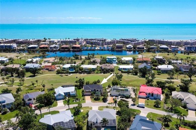 This impeccably maintained traditional style home sits on a on Beachview Golf Club in Florida - for sale on GolfHomes.com, golf home, golf lot