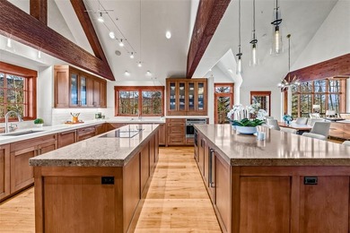 Refined. Modern. Private. Elevated.  Mountain luxury in on Raven Golf Club At Three Peaks in Colorado - for sale on GolfHomes.com, golf home, golf lot