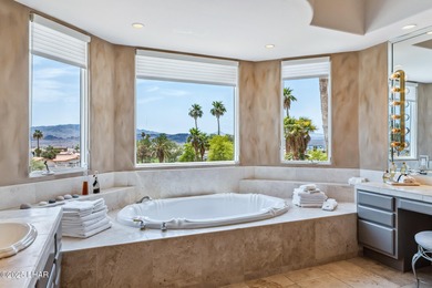 Experience one of Lake Havasu's most iconic residences, a true on London Bridge Golf Course in Arizona - for sale on GolfHomes.com, golf home, golf lot