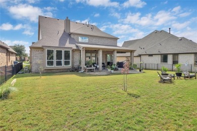 Elegant residence located at the first hole of the golf course on The Golf Club at Resort Eagle Mountain Lake in Texas - for sale on GolfHomes.com, golf home, golf lot