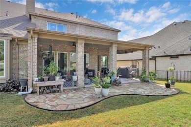 Elegant residence located at the first hole of the golf course on The Golf Club at Resort Eagle Mountain Lake in Texas - for sale on GolfHomes.com, golf home, golf lot