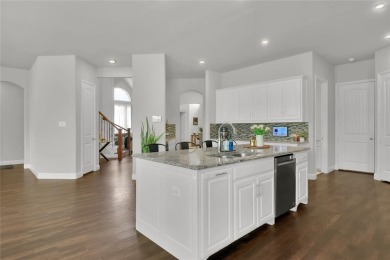 Elegant residence located at the first hole of the golf course on The Golf Club at Resort Eagle Mountain Lake in Texas - for sale on GolfHomes.com, golf home, golf lot