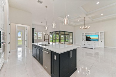 Experience unparalleled elegance in this stunning 2021-built on Palm Beach Gardens Golf Course in Florida - for sale on GolfHomes.com, golf home, golf lot