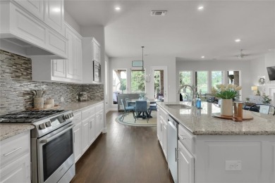 Elegant residence located at the first hole of the golf course on The Golf Club at Resort Eagle Mountain Lake in Texas - for sale on GolfHomes.com, golf home, golf lot