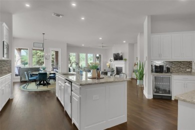 Elegant residence located at the first hole of the golf course on The Golf Club at Resort Eagle Mountain Lake in Texas - for sale on GolfHomes.com, golf home, golf lot