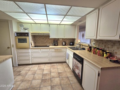 Beautiful home on the golf course in sunny Arizona in Sun on Quail Run Golf Course in Arizona - for sale on GolfHomes.com, golf home, golf lot