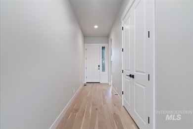 The Birkdale built by Tresidio Homes. The great room features on Falcon Crest Golf Club in Idaho - for sale on GolfHomes.com, golf home, golf lot