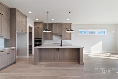 The Birkdale built by Tresidio Homes. The great room features on Falcon Crest Golf Club in Idaho - for sale on GolfHomes.com, golf home, golf lot