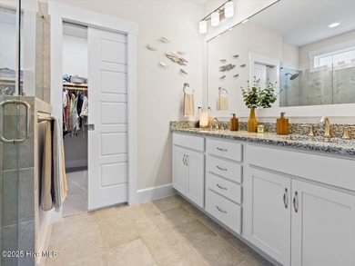 Experience exceptional coastal living at 429 Jackline Drive, a on Olde Point Golf and Country Club in North Carolina - for sale on GolfHomes.com, golf home, golf lot