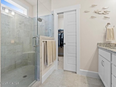 Experience exceptional coastal living at 429 Jackline Drive, a on Olde Point Golf and Country Club in North Carolina - for sale on GolfHomes.com, golf home, golf lot