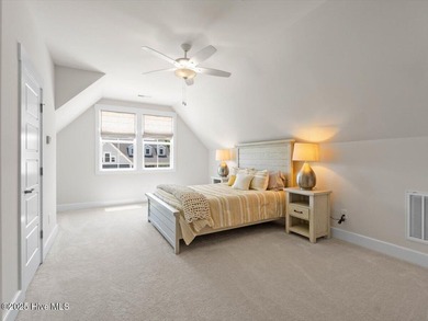 Experience exceptional coastal living at 429 Jackline Drive, a on Olde Point Golf and Country Club in North Carolina - for sale on GolfHomes.com, golf home, golf lot