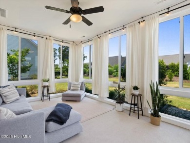 Experience exceptional coastal living at 429 Jackline Drive, a on Olde Point Golf and Country Club in North Carolina - for sale on GolfHomes.com, golf home, golf lot