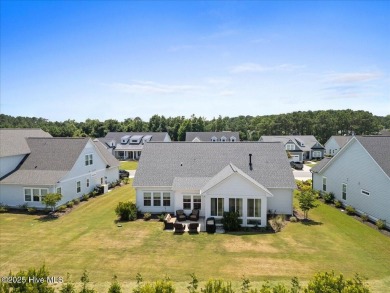 Experience exceptional coastal living at 429 Jackline Drive, a on Olde Point Golf and Country Club in North Carolina - for sale on GolfHomes.com, golf home, golf lot