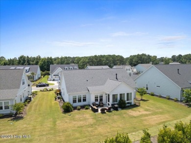 Experience exceptional coastal living at 429 Jackline Drive, a on Olde Point Golf and Country Club in North Carolina - for sale on GolfHomes.com, golf home, golf lot