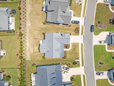 Experience exceptional coastal living at 429 Jackline Drive, a on Olde Point Golf and Country Club in North Carolina - for sale on GolfHomes.com, golf home, golf lot