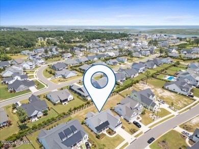 Experience exceptional coastal living at 429 Jackline Drive, a on Olde Point Golf and Country Club in North Carolina - for sale on GolfHomes.com, golf home, golf lot