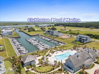 Experience exceptional coastal living at 429 Jackline Drive, a on Olde Point Golf and Country Club in North Carolina - for sale on GolfHomes.com, golf home, golf lot