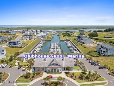 Experience exceptional coastal living at 429 Jackline Drive, a on Olde Point Golf and Country Club in North Carolina - for sale on GolfHomes.com, golf home, golf lot