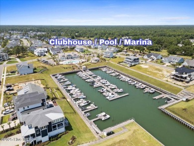 Experience exceptional coastal living at 429 Jackline Drive, a on Olde Point Golf and Country Club in North Carolina - for sale on GolfHomes.com, golf home, golf lot
