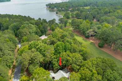 Welcome to your dream home at Reynolds Lake Oconee, where luxury on Great Waters Course At Reynolds Plantation in Georgia - for sale on GolfHomes.com, golf home, golf lot